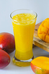 Fresh manga fruit is high in vitamins, healthy mango juice.