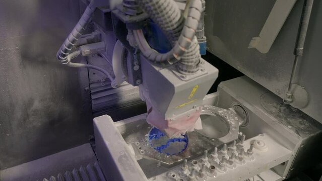 Automated milling machine operating at the stomatology clinic. Milling machine deals with the production of stomatology replacement teeth. Stomatology Milling machine creating the artificial dentures.