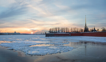Sunset with a view of the Peter and Paul Fortress and the Neva River in winter. Saint Petersburg. Russia.
