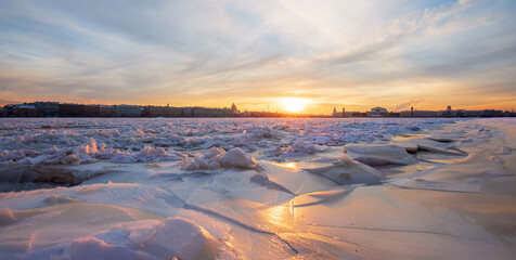 Panorama of the frozen river Neva and the city embankment. Saint Petersburg. Russia.
