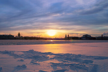 Winter view of the frozen Neva River and the historical center of St. Petersburg. Russia.