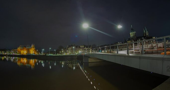 Amsterdam Night Harbor Bridge Water Canal Grand Hotel Basilica of Saint Nicholas Timelapse
