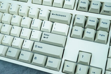 Vintage computer keyboard isolated on gray background