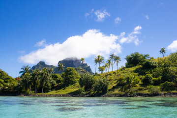 Panoramic view of Mount Otemanu and surrounding landscape from the turquoise lagoon in Bora Bora French Polynesia
