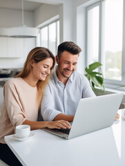 A Photo of a Young Couple Reviewing Their Investment Portfolio on a Laptop in a Bright Modern Apartment