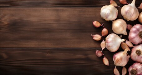 Obraz na płótnie Canvas The Earthy Charm of Fresh Garlic on a Rustic Wooden Background