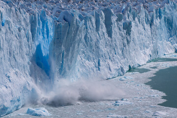 Ice calving from the terminus of the Perito Moreno Glacier in Los Glaciares National Park, Santa...