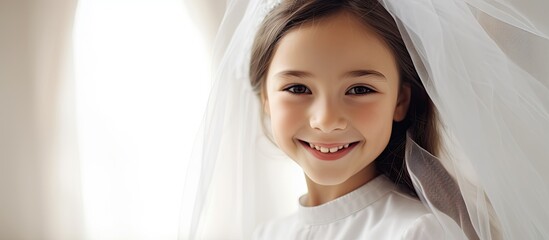 Gorgeous girl in white dress celebrating First Communion. - obrazy, fototapety, plakaty
