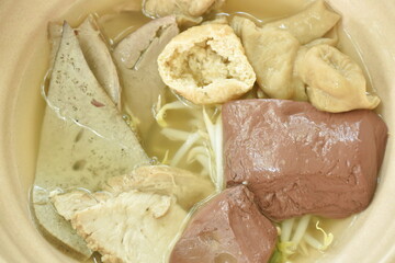 boiled pork blood and entrails with bean sprout in clear soup on bowl 
