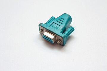 The blue-green serial connector looks similar to the blue VGA connector on a white background.