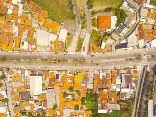 Transportation Photography. Aerial Landscapes. Drone view of Country Road connecting Cileunyi - Garut. City highway in the Bandung area - Indonesia. Aerial Shot from a flying drone.