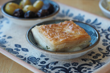 Traditional Turkish Cuisine Pastries and olive on table 