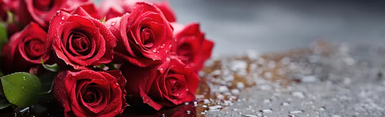 Foto auf Glas Dozen crisp red roses lying on side with dew drops © Vivid Pixels
