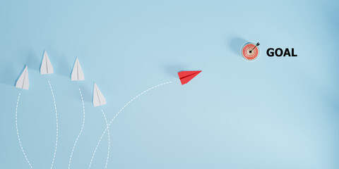 Red airplane flying towards target. The concept of leadership, achieving the goal. Success. risk...