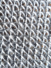 Crocheting of jute, yarn, raffia blue in a circle close-up as a background. High quality photo