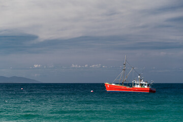 red boat on the sea