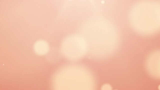 Trend color concept of 2024 Peach Fuzz background bokeh particle abstract blur