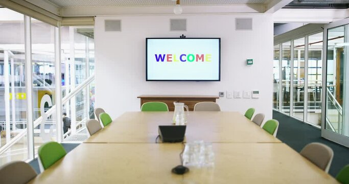 Monitor, meeting or empty office for presentation with table, chairs or corporate company. Background, conference or welcome text words on screen in modern boardroom for training or business project
