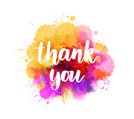Thank you - hand lettering phrase on purple watercolor imitation color splash. Modern calligraphy inspirational quote.