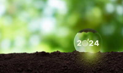Enviromentally sustainable company target in 2024. Carbon neutral  and net zero concept. Reducing carbon footprint. Decreasing CO2 emissions target. Limit climate change and global warming. - obrazy, fototapety, plakaty