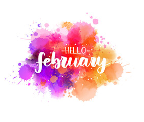 Hello february - handwritten modern calligraphy inspirational text on multicolored watercolor paint splash. Background with abstract dots decoration.