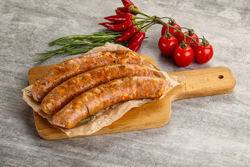 Raw sausages with spices and herbs