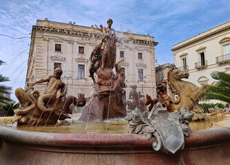 Diana Fountain in Archimedes Square, Ortigia, Syracuse, an historic city in Sicily , Italy