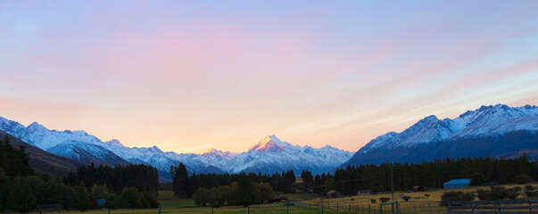 Banner travel of beautiful view with Aoraki Mount Cook and the road leading to Mount Cook Village....