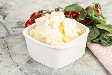 Soft cream cheese in the bowl