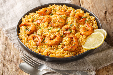 Shrimp risotto pairing the bold flavors of Parmesan and lemon with creamy rice and juicy shrimp...