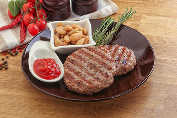Grilled beef burger cutlet with sauce
