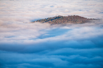 Beautiful winter mountain landscape. Moody sunset seen from the Mount Smerek in the Bieszczady...