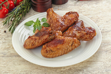 Roasted chicken wings with spicy sauce
