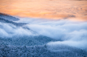 Beautiful winter mountain landscape. Moody sunset seen from the Mount Smerek in the Bieszczady National Park, Poland. - obrazy, fototapety, plakaty