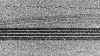 Aerial top view car tire marks burnout, Tire marks on the asphalt road, Tire mark on race track...