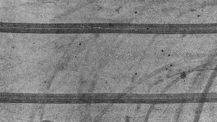 Aerial top view car tire marks burnout, Tire marks on the asphalt road, Tire mark on race track...
