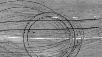 Aerial top view car tire marks burnout, Tire marks on the asphalt road, Tire mark on race track...