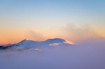 Beautiful winter mountain landscape. Moody sunset seen from the Mount Smerek in the Bieszczady...