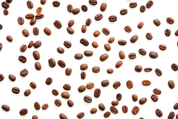 Top view Roasted coffee beans scattered isolated on a white background.