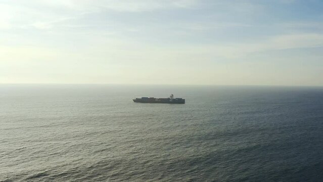 Drone, ship and cargo by ocean in nature environment, transportation and travel on water with logistics. Sea, boat and goods by coastline, aerial and distribution with containers for global delivery