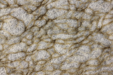Industrial pollution. Foam bubbles from dirty water,background pattern.