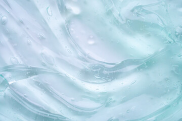 Transparent clear blue liquid serum gel cosmetic texture background