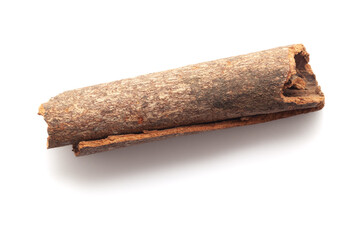 Close-up of Cinnamon stick (Cinnamomum verum) isolated on a white background.