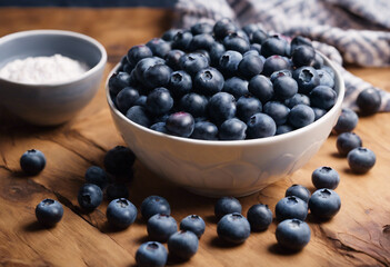 blueberries in a bowl on wooden background
