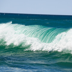 wave breaking on the beach