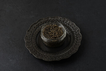 black caviar on a black background