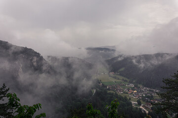 Mist and rainy weather over beautiful mountains and landscape in Austria
