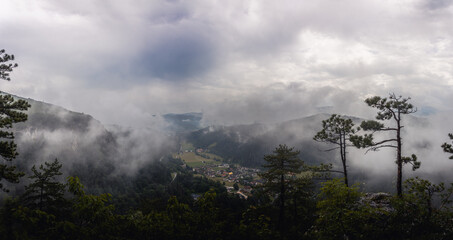 Mist and rainy weather over beautiful mountains and landscape in Austria