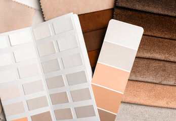 a variety of fabrics with a color palette. New trending PANTONE Peach Fuzz colour of 2024 year - 690565382