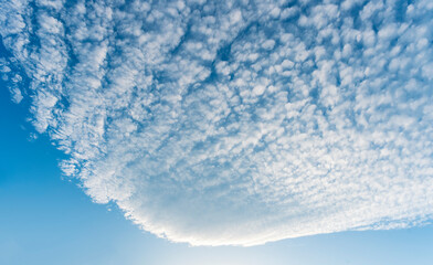 cloudy sky background for wallpaper and design, day skyscape with white beautiful clouds and blue sky